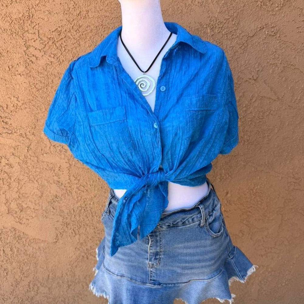 Blue button up blouse with sheer flowers